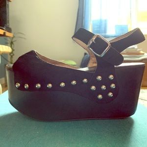 Studded black flatforms